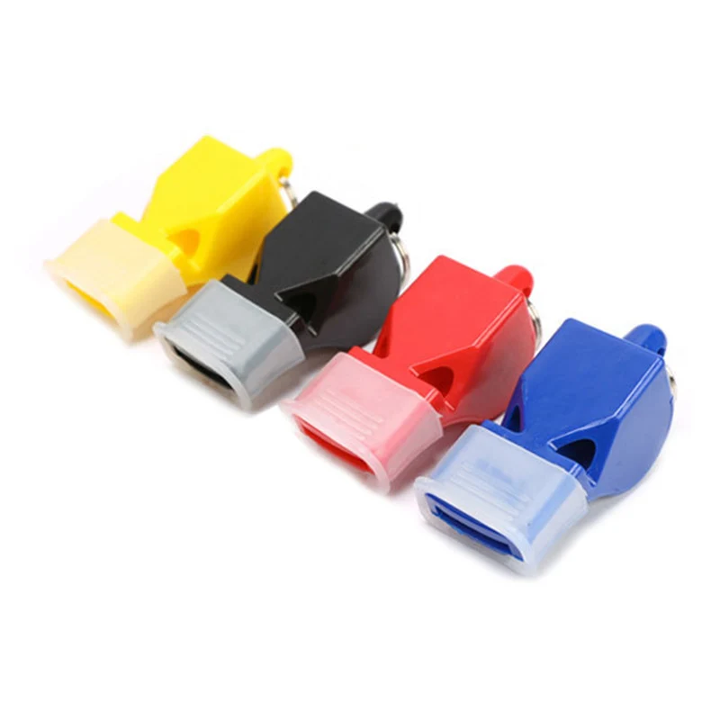 Muovinen pilli kaulanauhalla